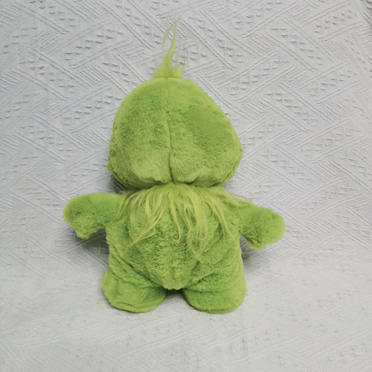 The plush toy of Grinch character