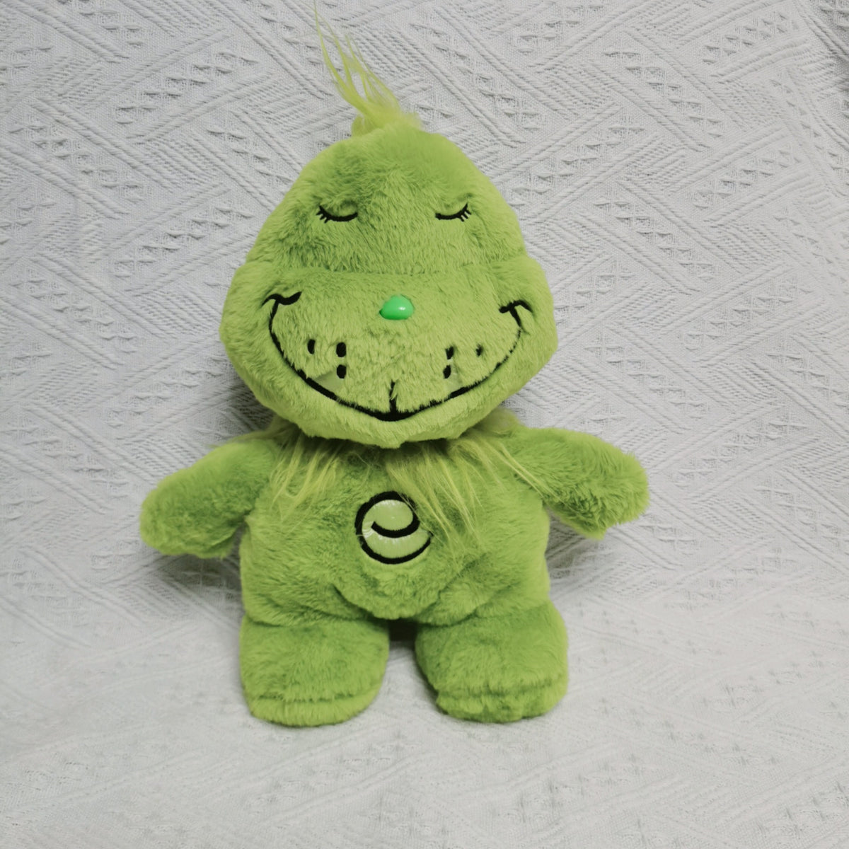 The plush toy of Grinch character