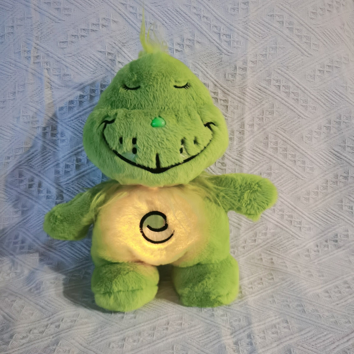 The plush toy of Grinch character